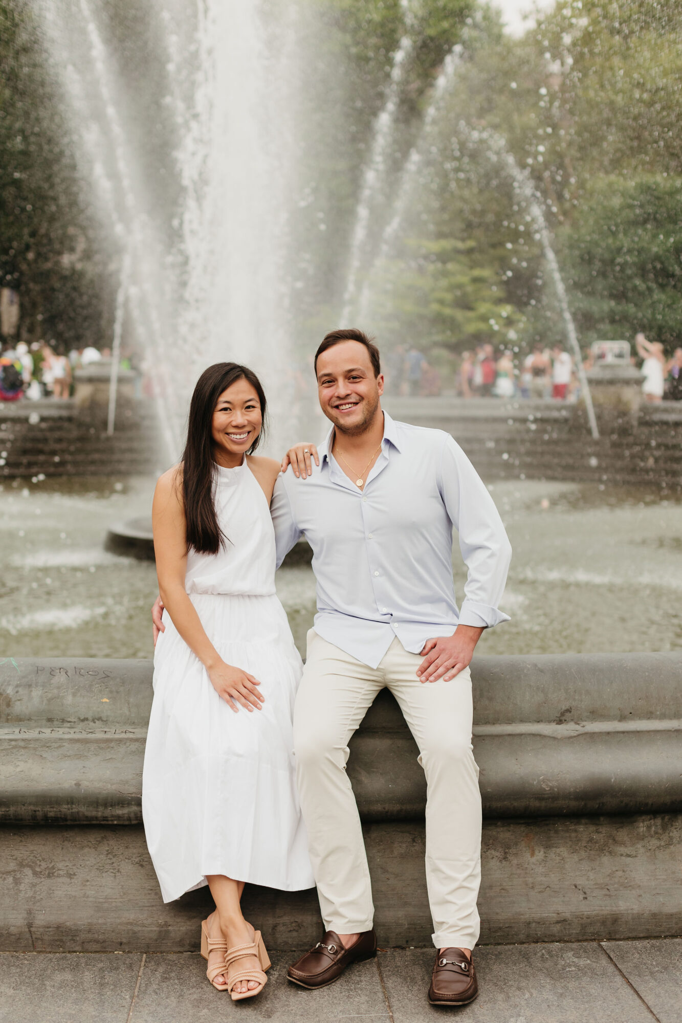 Washington square park, engagement photos, fountain, new york city streets, white dress